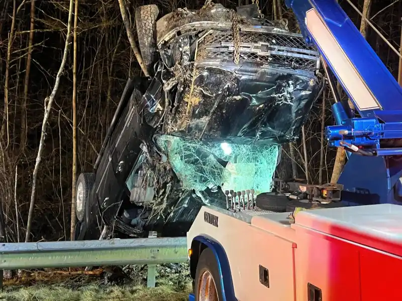 Nathan's Body Shop and Wrecker Service - Sylva NC Lifting a Flipped Truck