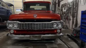 Front view of a 1959 Ford F-100 Custom Pickup restored by Nathan's Body Shop, Sylva NC