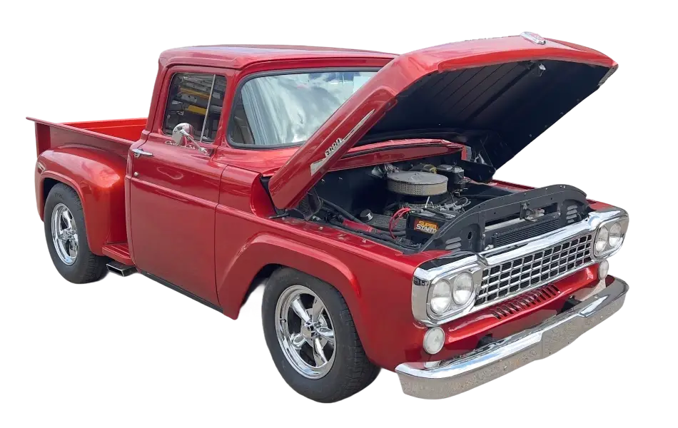 Restored classic red truck with hood open at Franklin Body Shop - Nathan’s Body Shop & Wrecker Service.