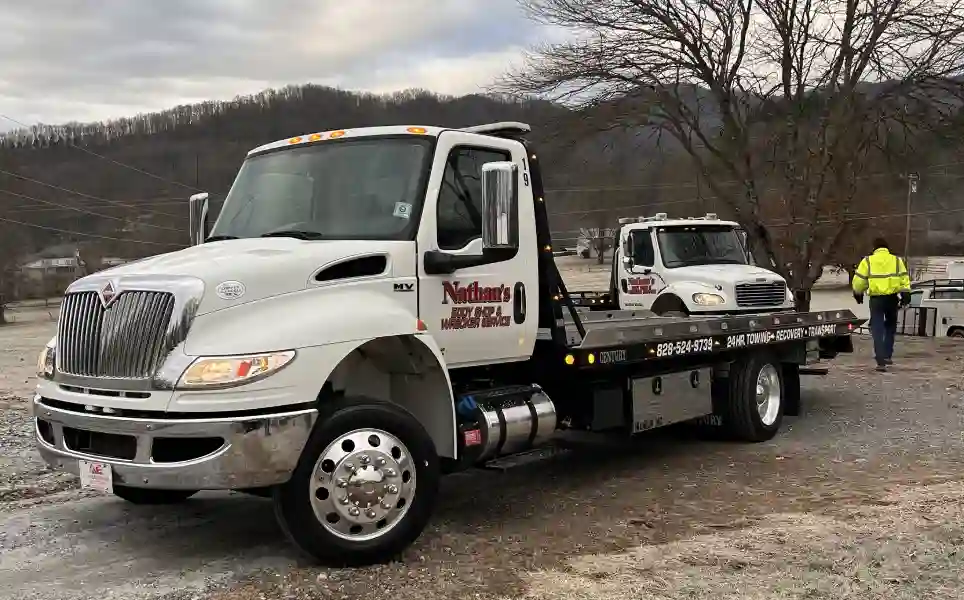 Nathan’s Body Shop & Wrecker Service tow trucks, providing 24/7 towing in Franklin NC and Macon County.