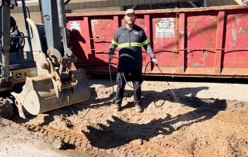Spraying Elimin8 neutralizing hazardous materials during spill cleanup.