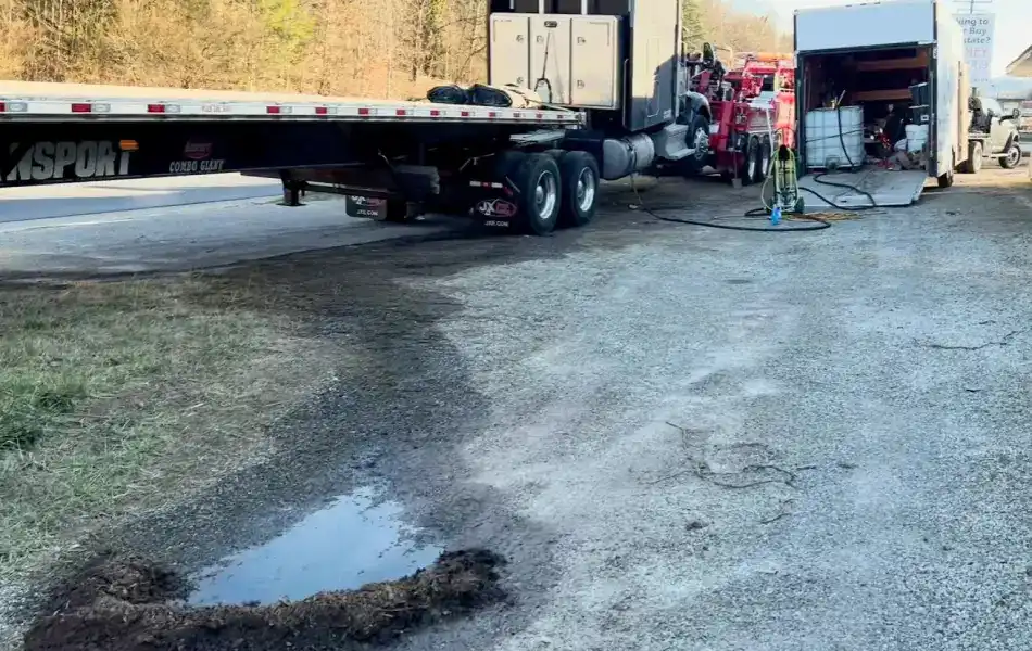 Oil spill cleanup of a tractor trailer in Macon County, NC.